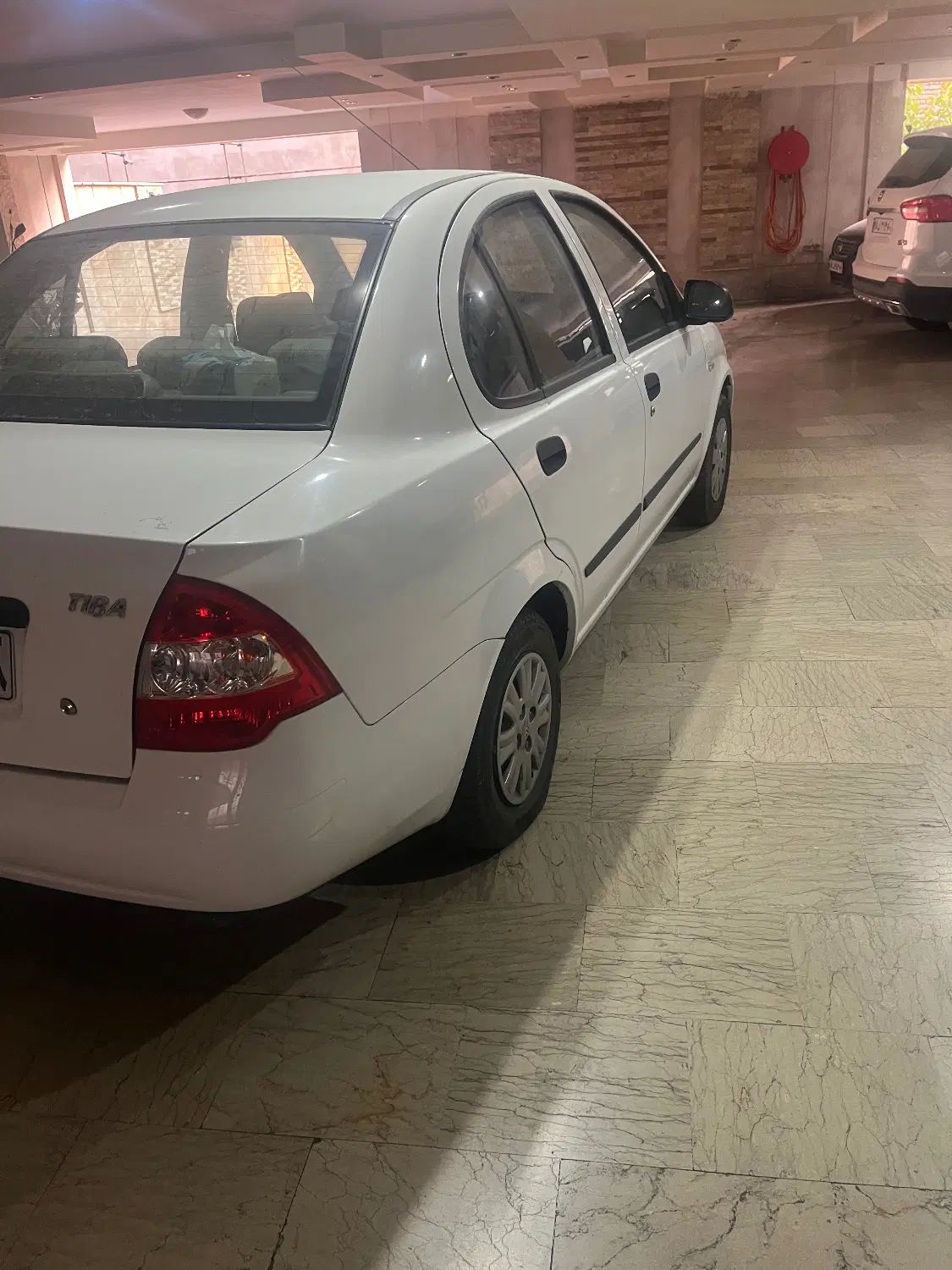 تیبا صندوق دار SX - 1399