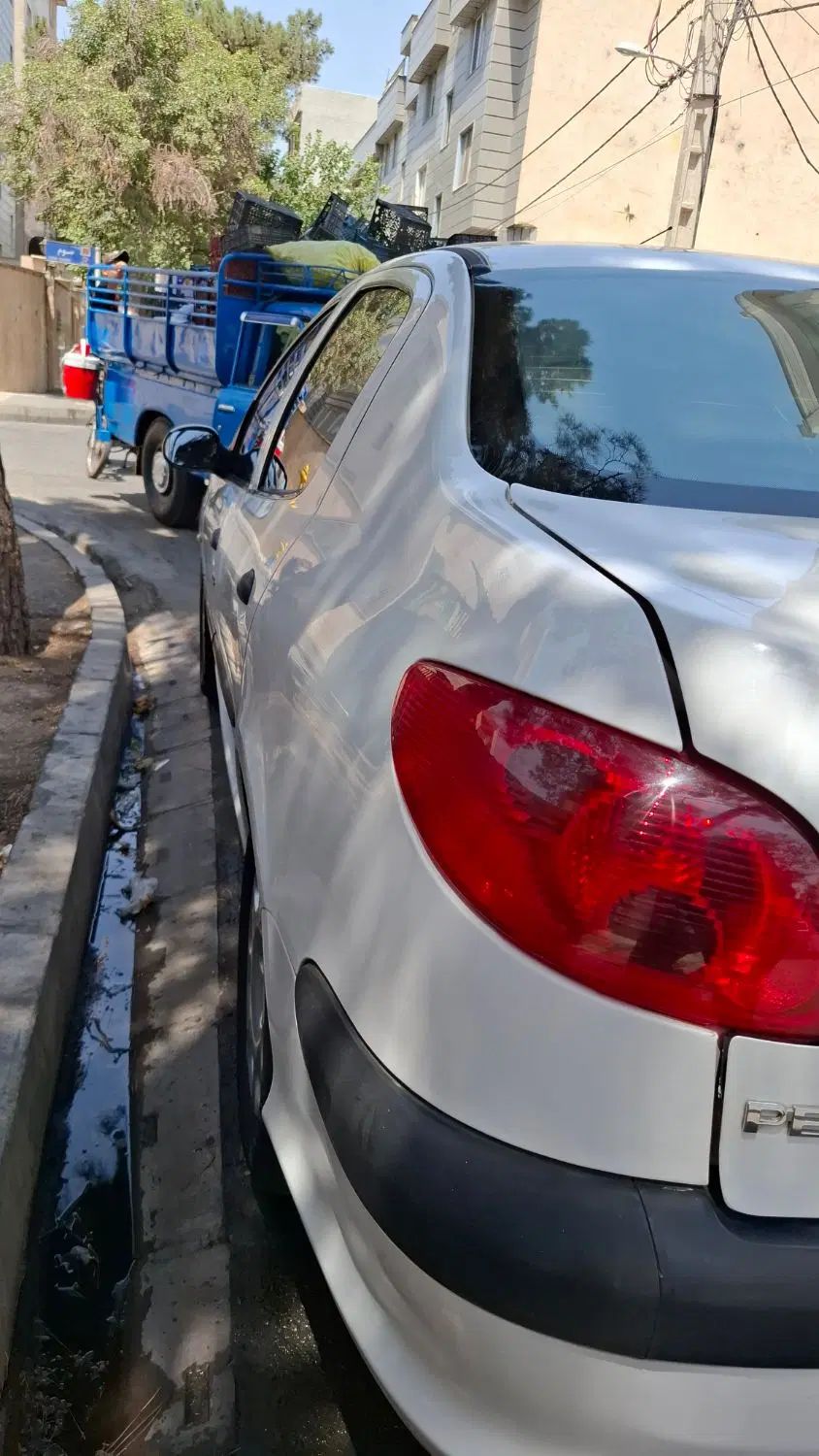 پژو ۲۰۶ صندوق دار v8 - 1394