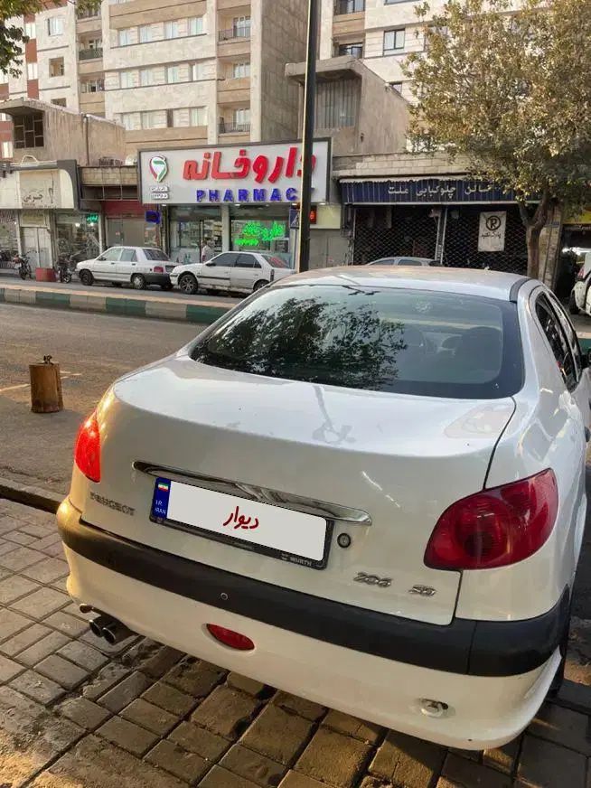 پژو ۲۰۶ صندوق دار v8 - 1395