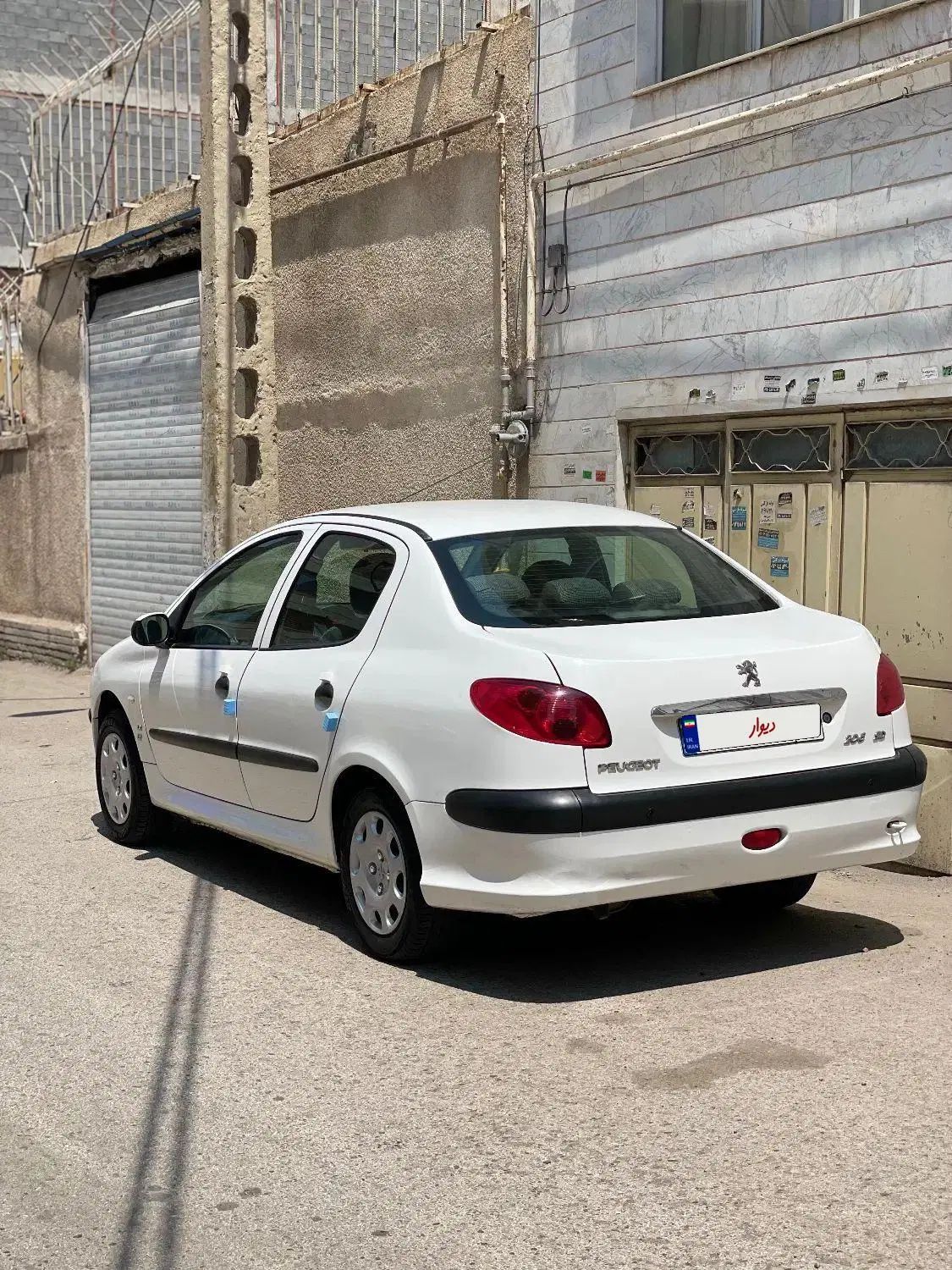 پژو ۲۰۶ صندوق دار v8 - 1396