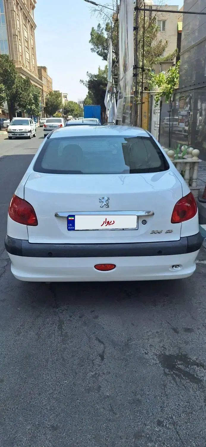 پژو ۲۰۶ صندوق دار v8 - 1396