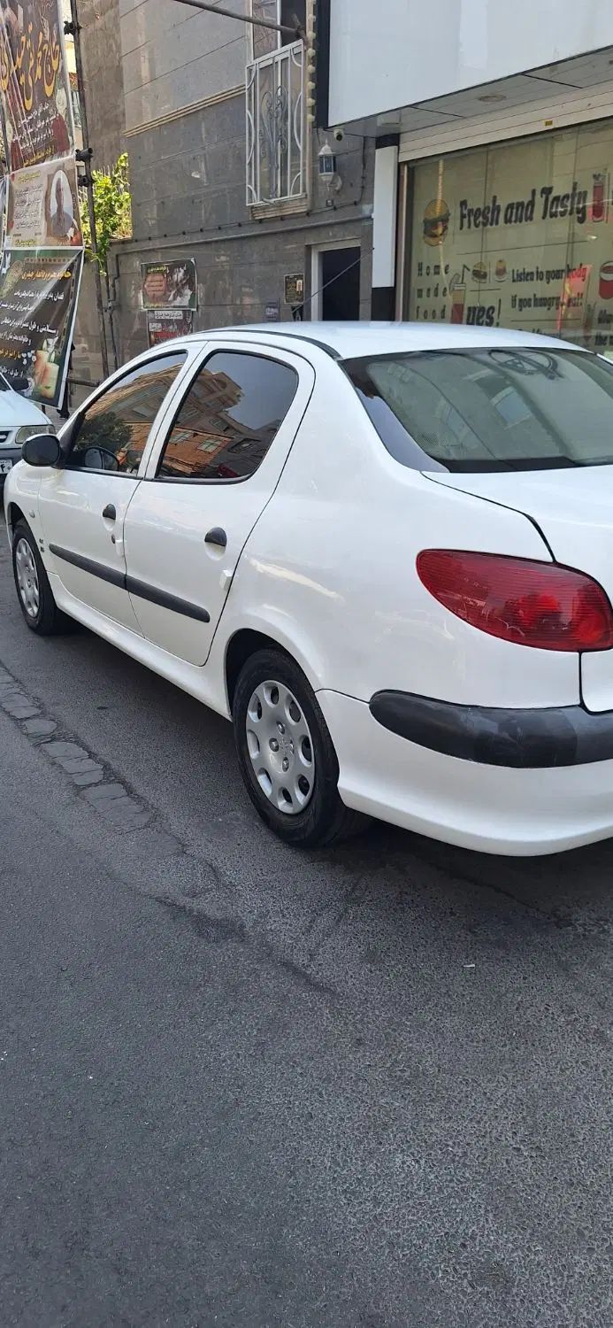 پژو ۲۰۶ صندوق دار v8 - 1396