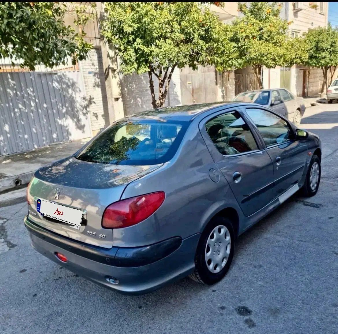 پژو ۲۰۶ صندوق دار v8 - 1390