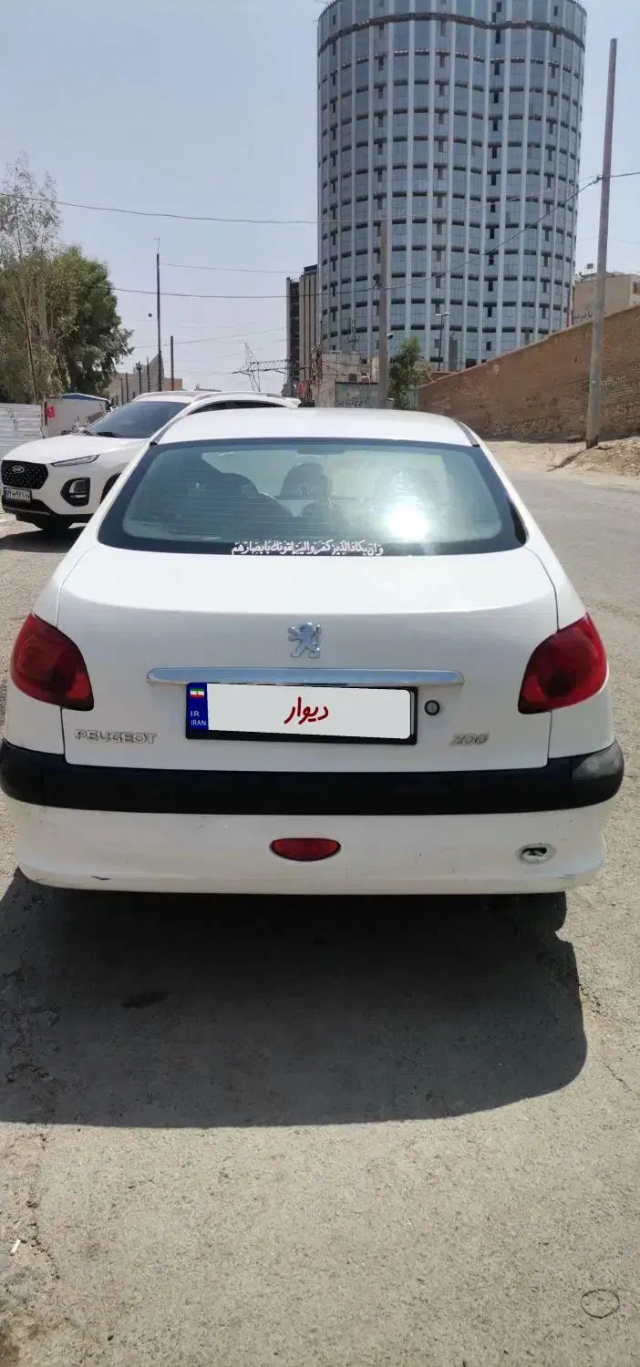 پژو ۲۰۶ صندوق دار v8 - 1395