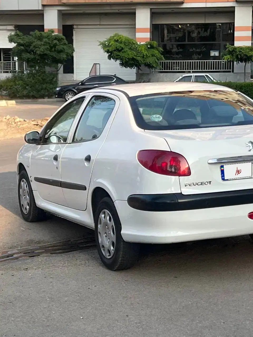 پژو ۲۰۶ صندوق دار v8 - 1397