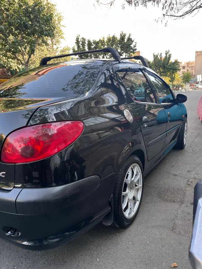 پژو ۲۰۶ صندوق دار v8 - 1396