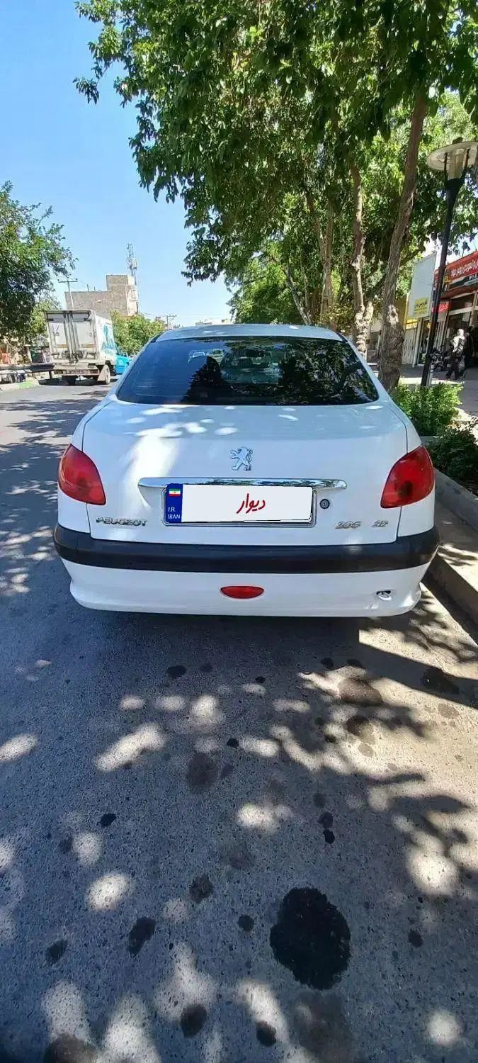 پژو ۲۰۶ صندوق دار v8 - 1394