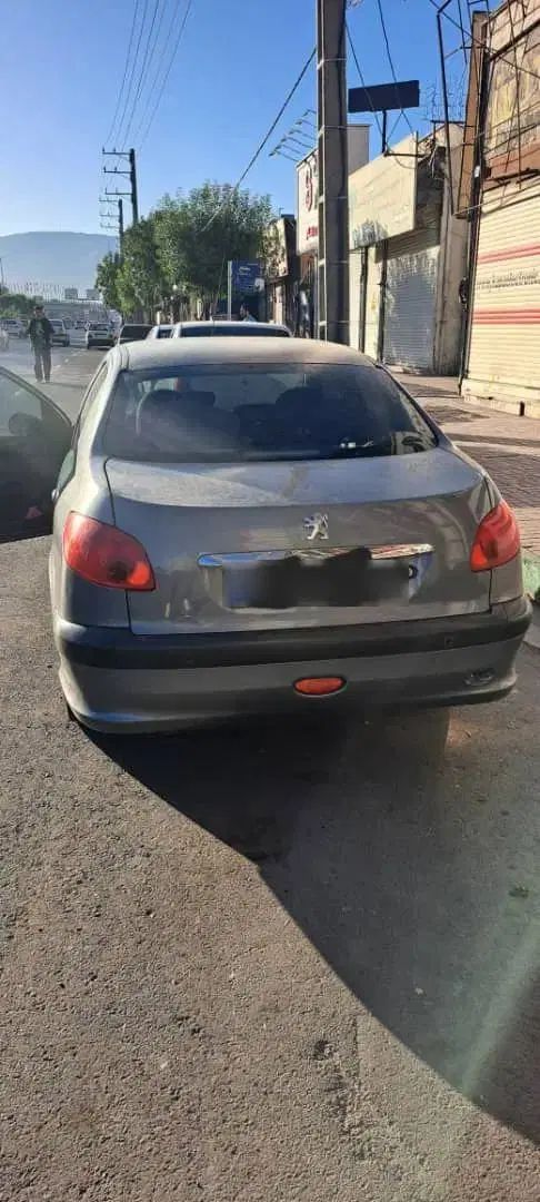 پژو ۲۰۶ صندوق دار v8 - 1396