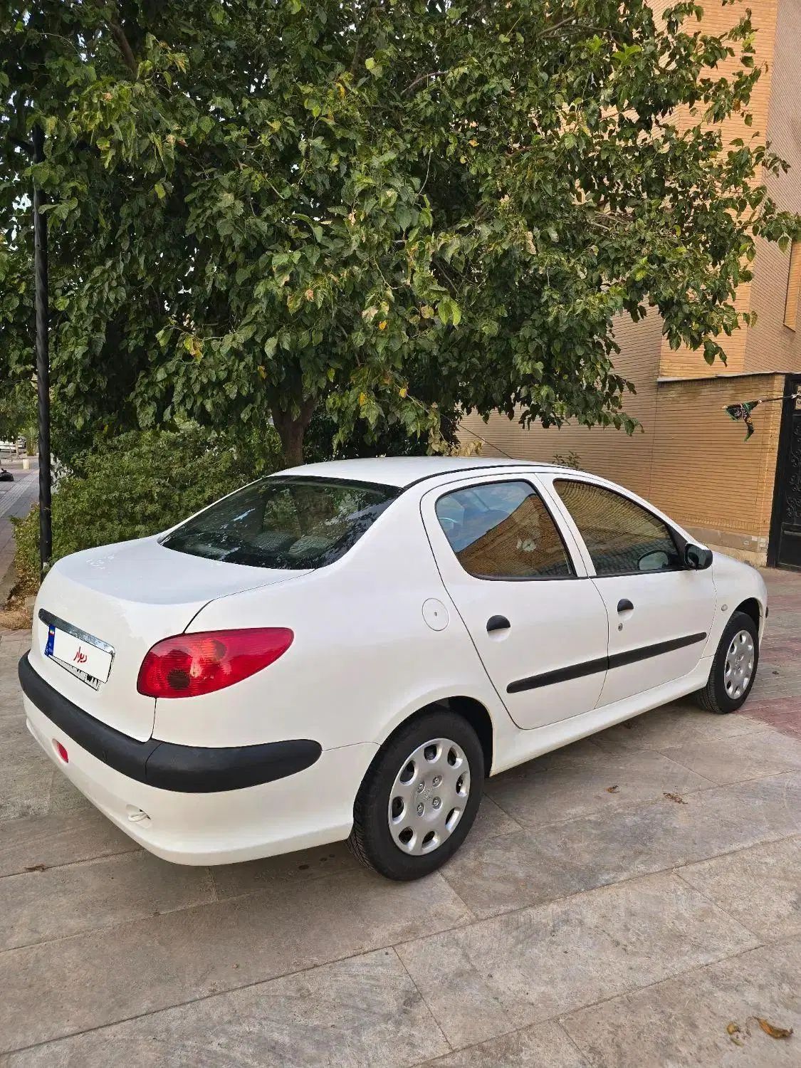 پژو ۲۰۶ صندوق دار v8 - 1395