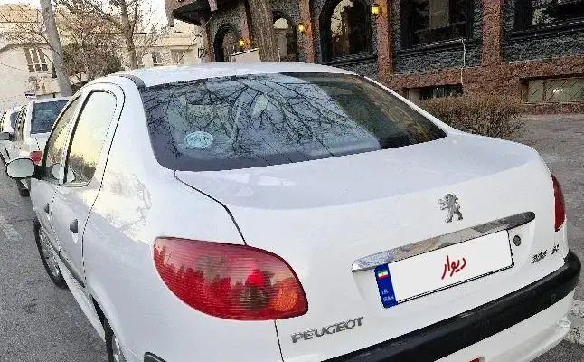 پژو ۲۰۶ صندوق دار v8 - 1396