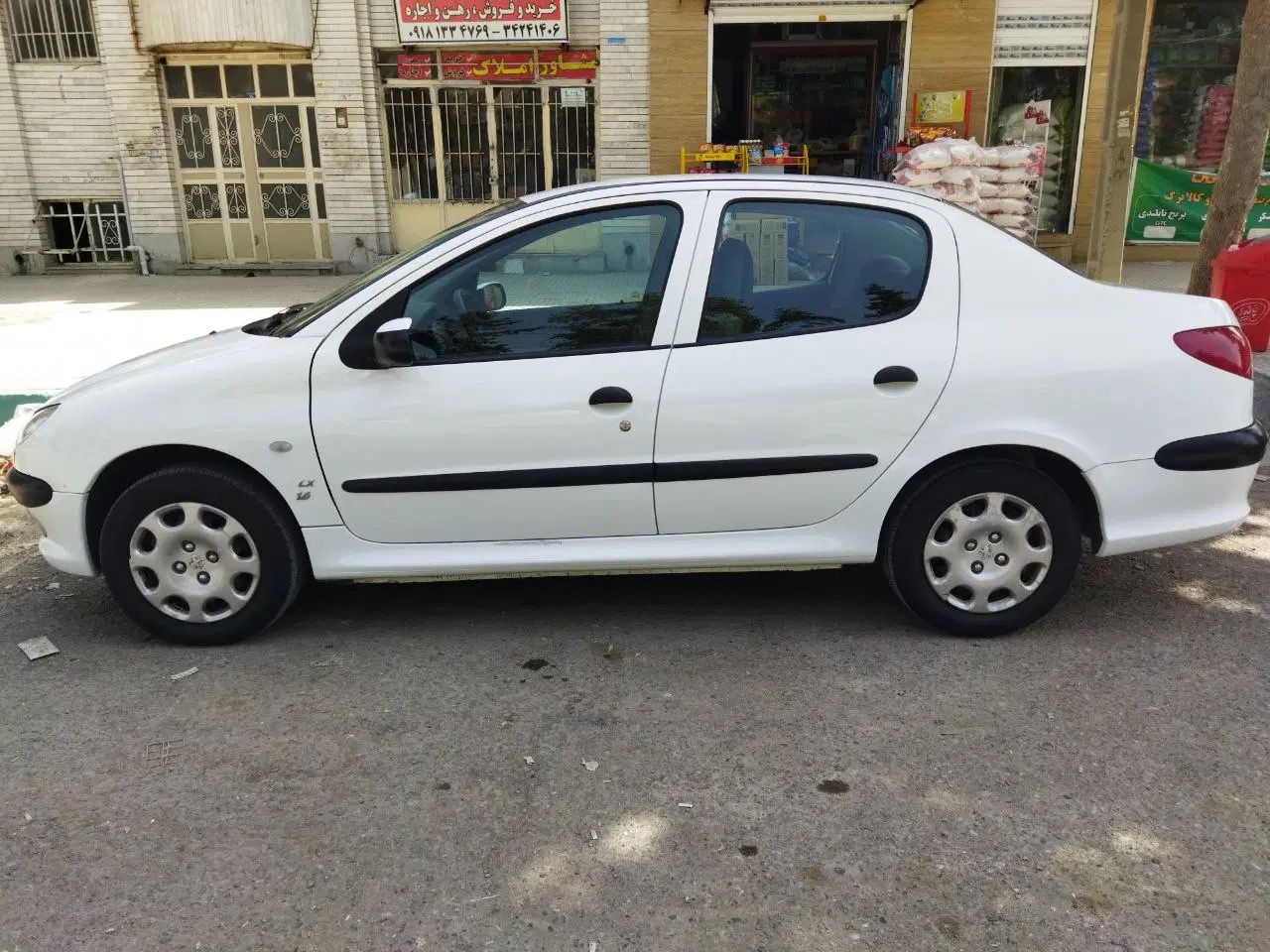 پژو ۲۰۶ صندوق دار v8 - 1397