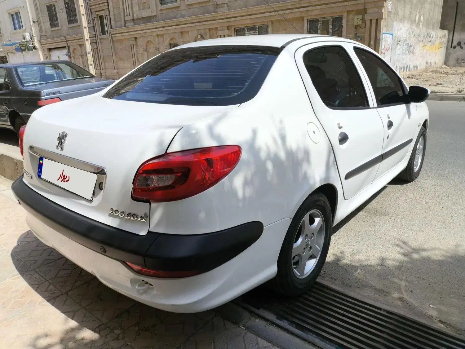 پژو ۲۰۶ صندوق دار v8 - 1394