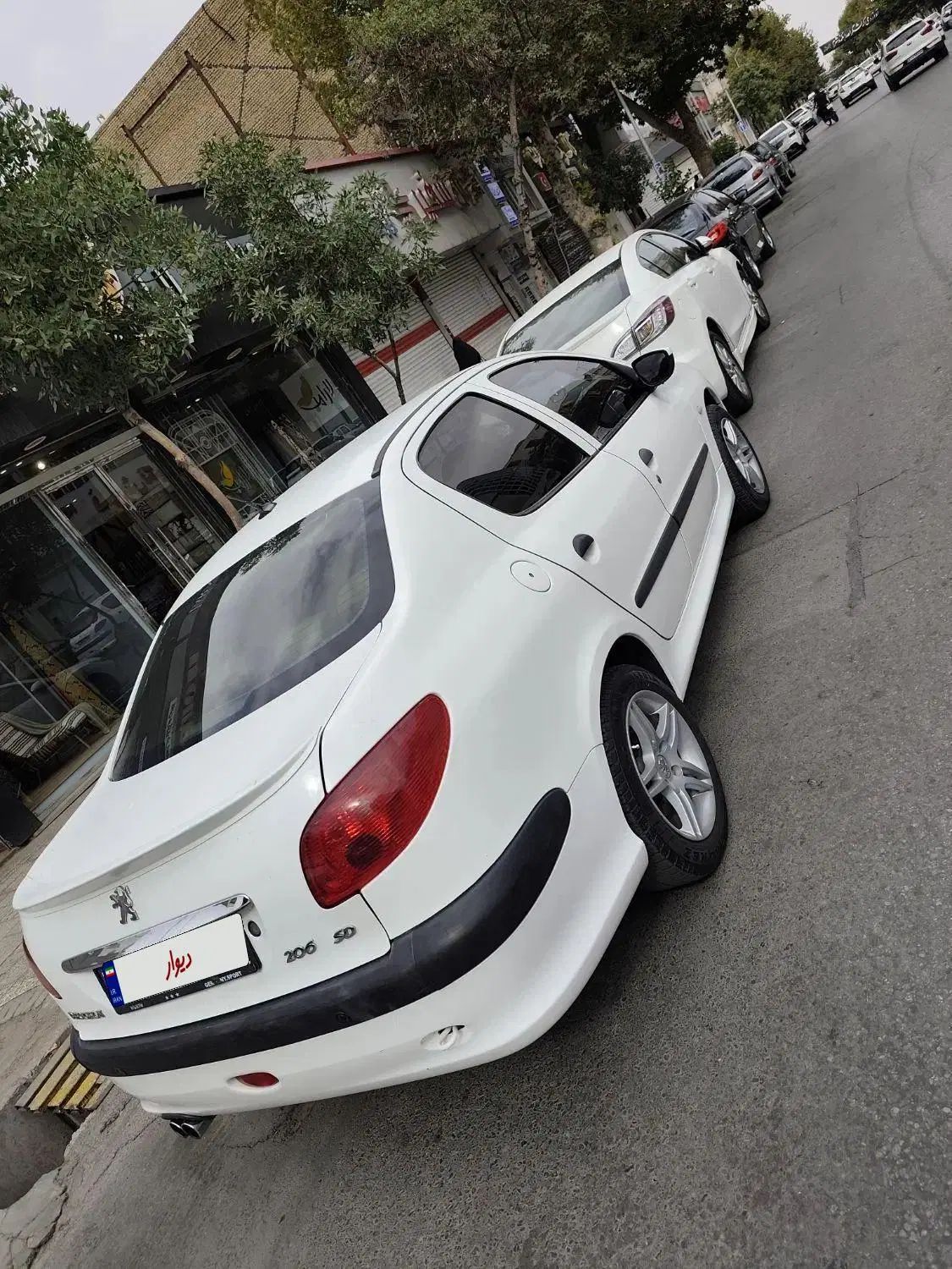 پژو ۲۰۶ صندوق دار v8 - 1397