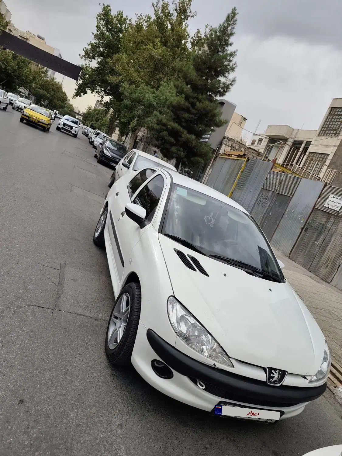 پژو ۲۰۶ صندوق دار v8 - 1397