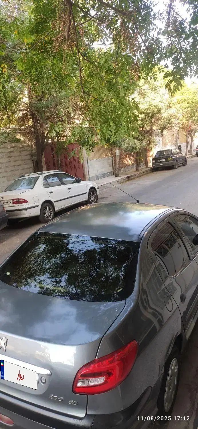 پژو ۲۰۶ صندوق دار v8 - 1391