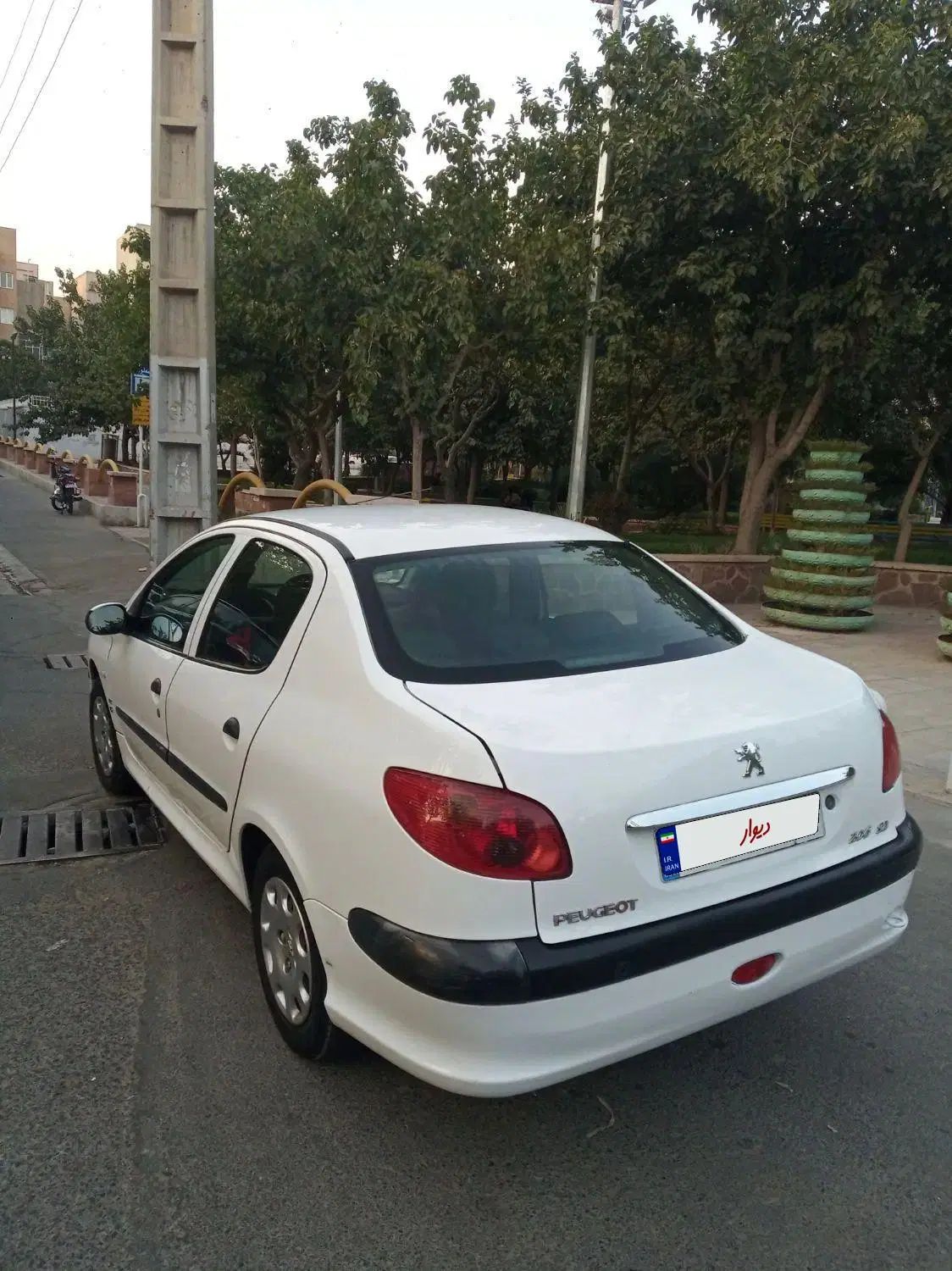 پژو ۲۰۶ صندوق دار v8 - 1396