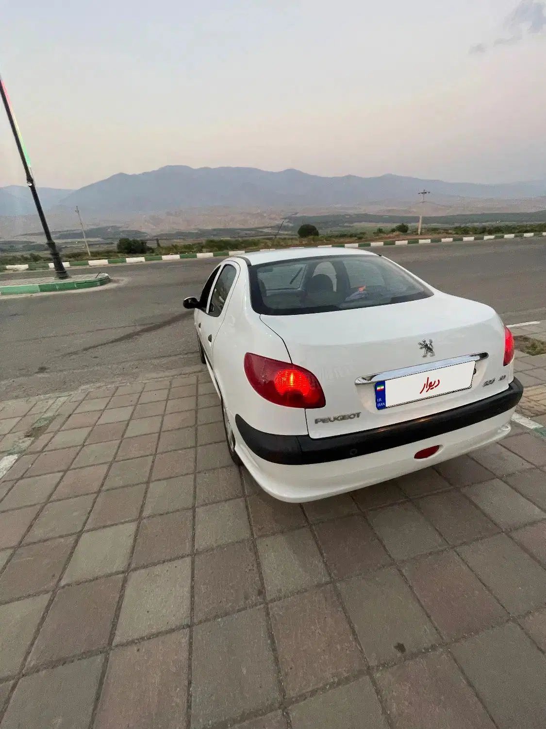 پژو ۲۰۶ صندوق دار v8 - 1397