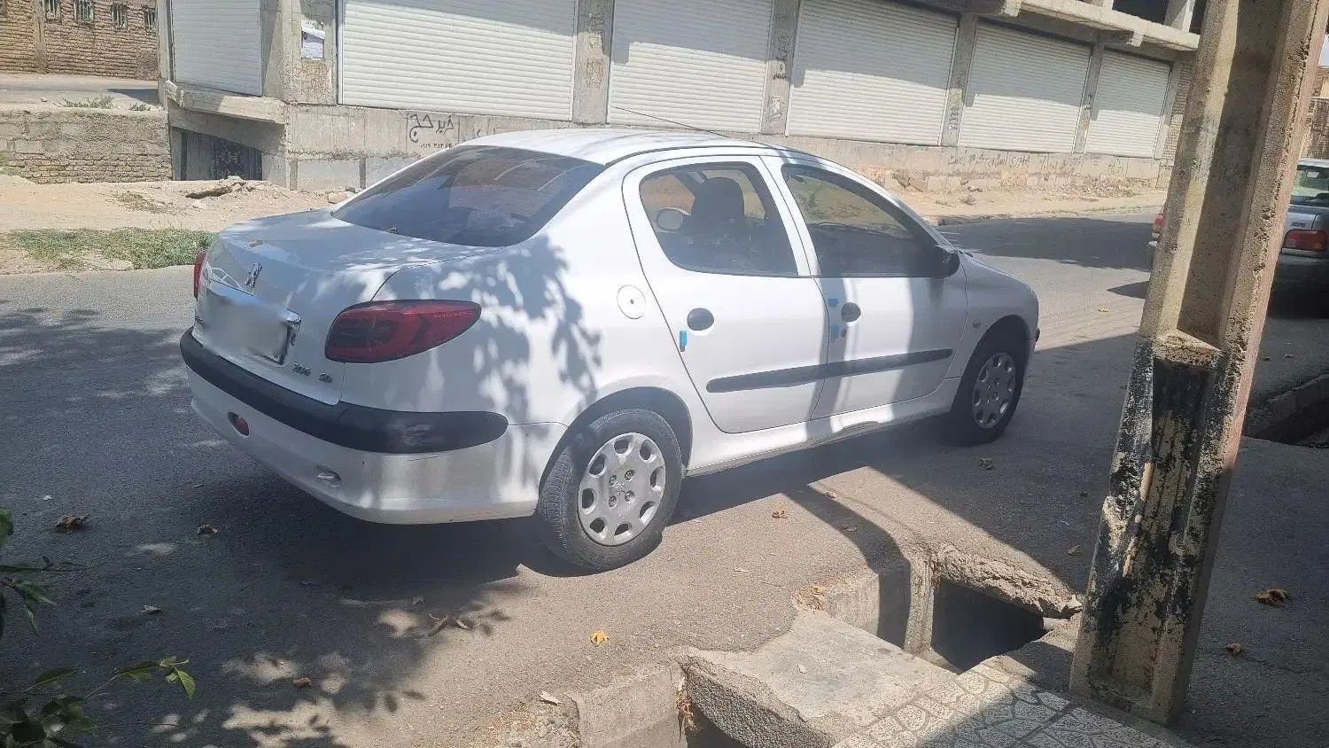 پژو ۲۰۶ صندوق دار v8 - 1394