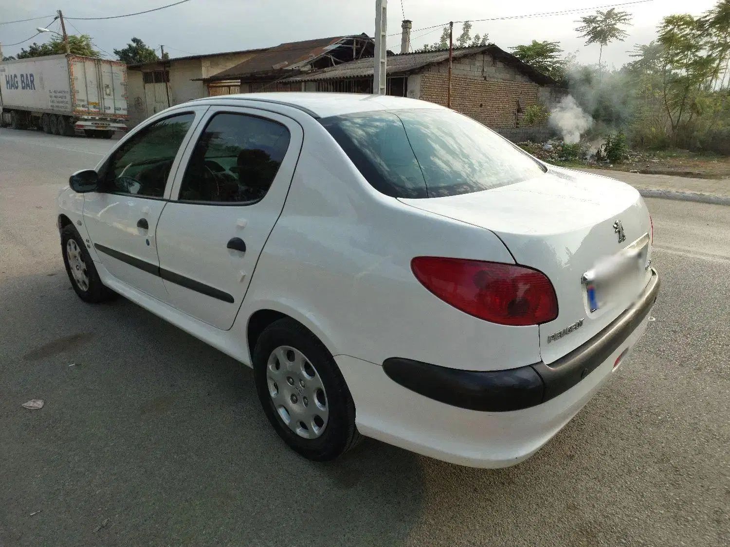 پژو ۲۰۶ صندوق دار v8 - 1396