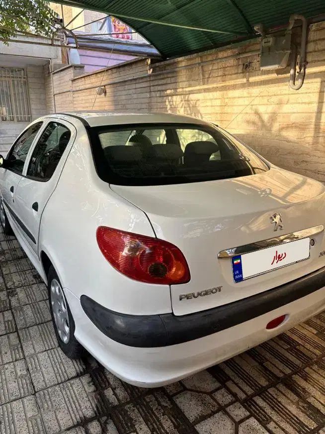 پژو ۲۰۶ صندوق دار v8 - 1393