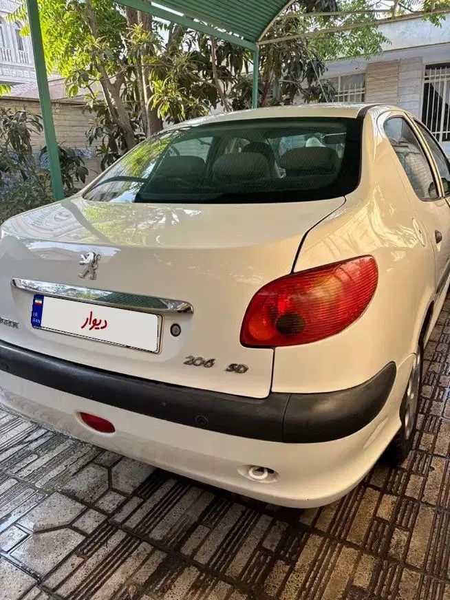 پژو ۲۰۶ صندوق دار v8 - 1393