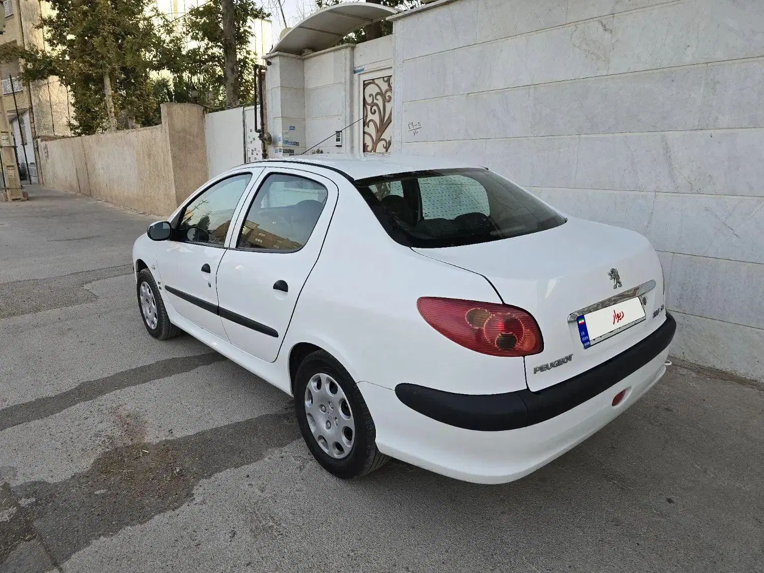 پژو ۲۰۶ صندوق دار v8 - 1395