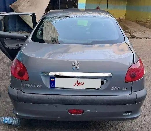 پژو ۲۰۶ صندوق دار v8 - 1391