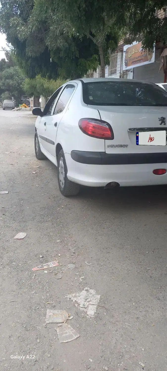 پژو ۲۰۶ صندوق دار v8 - 1391
