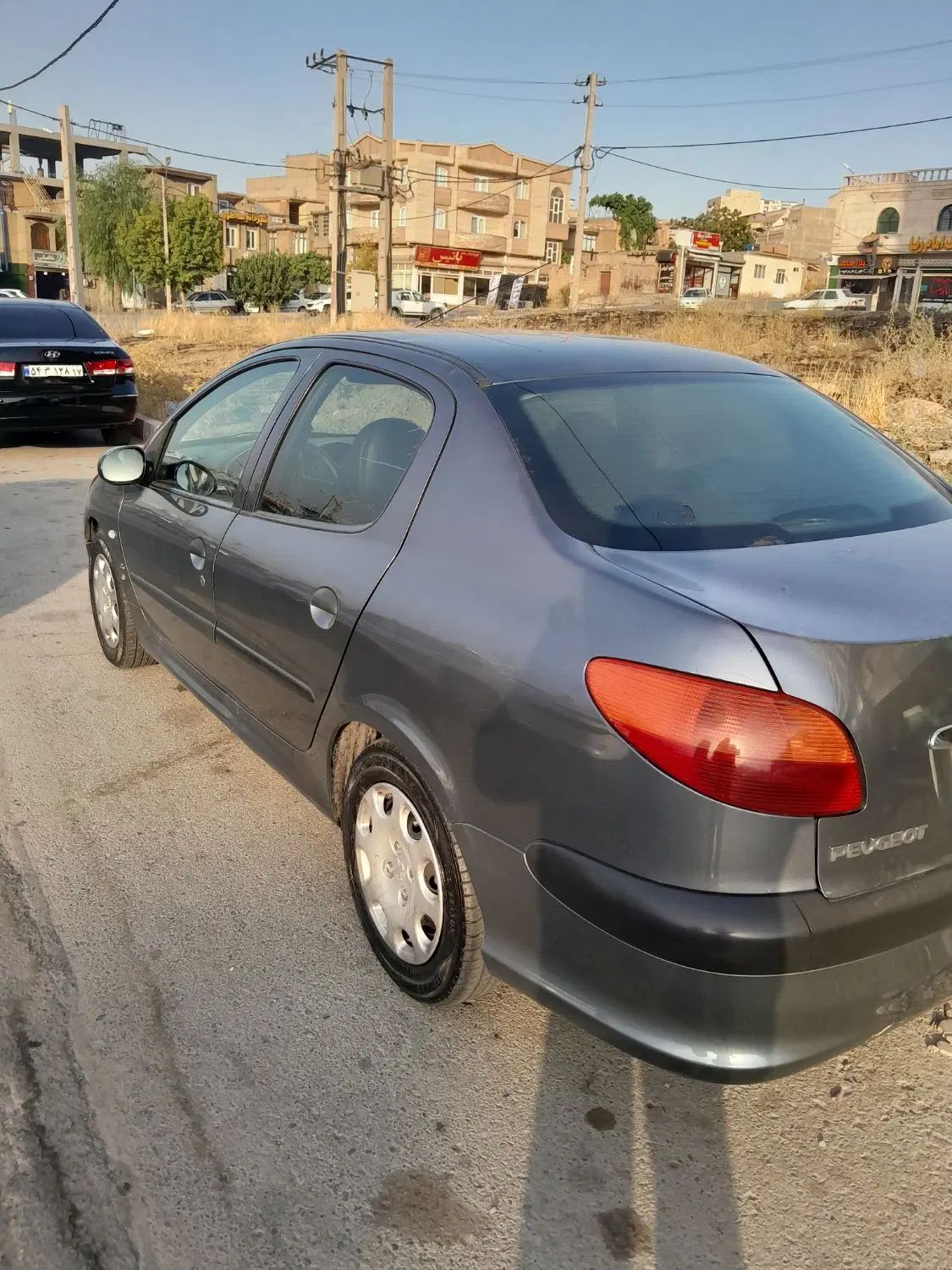 پژو ۲۰۶ صندوق دار v8 - 1391