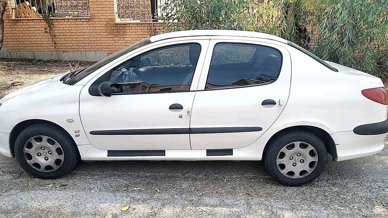 پژو ۲۰۶ صندوق دار v8 - 1394