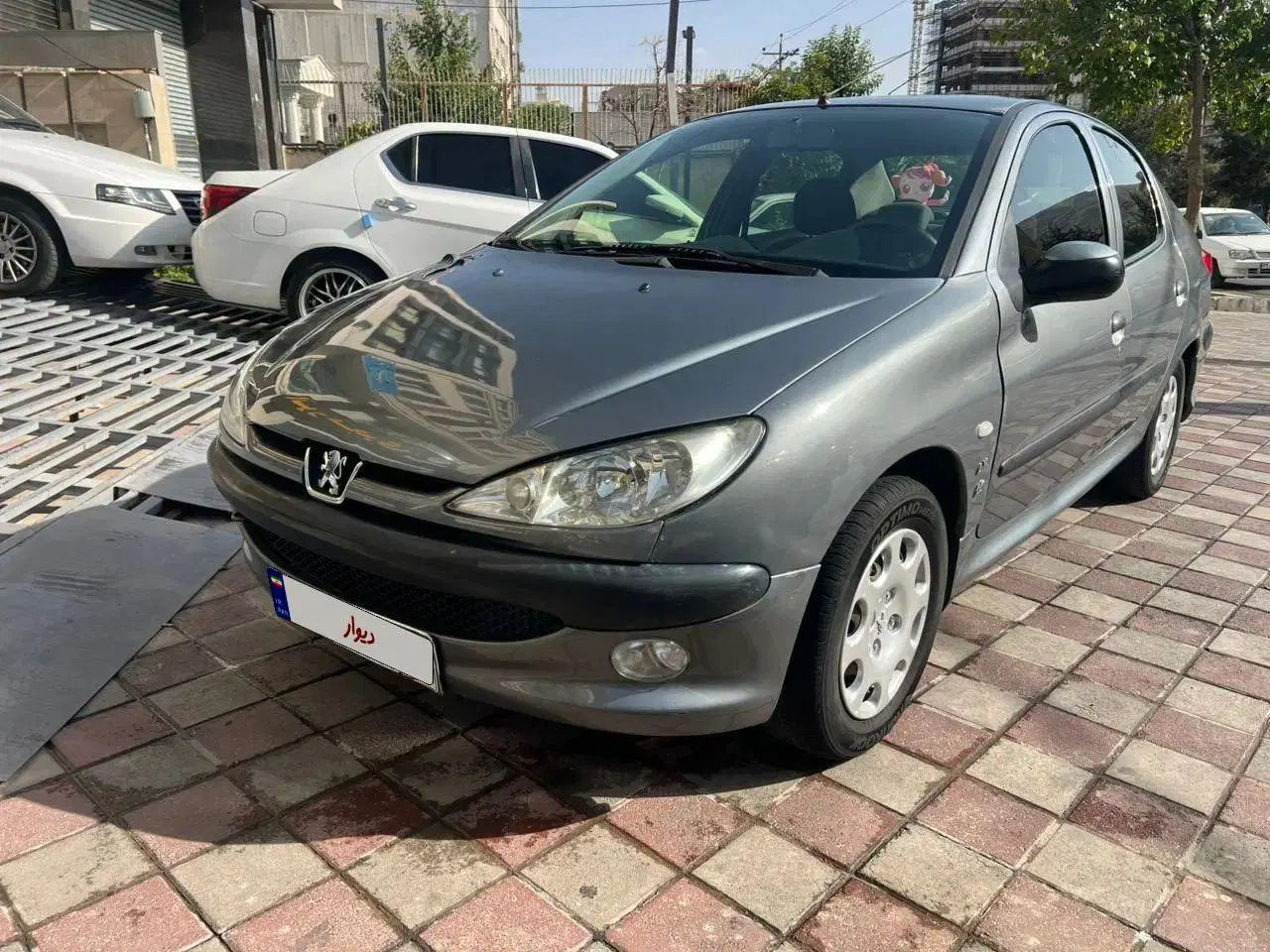 پژو ۲۰۶ صندوق دار v8 - 1395