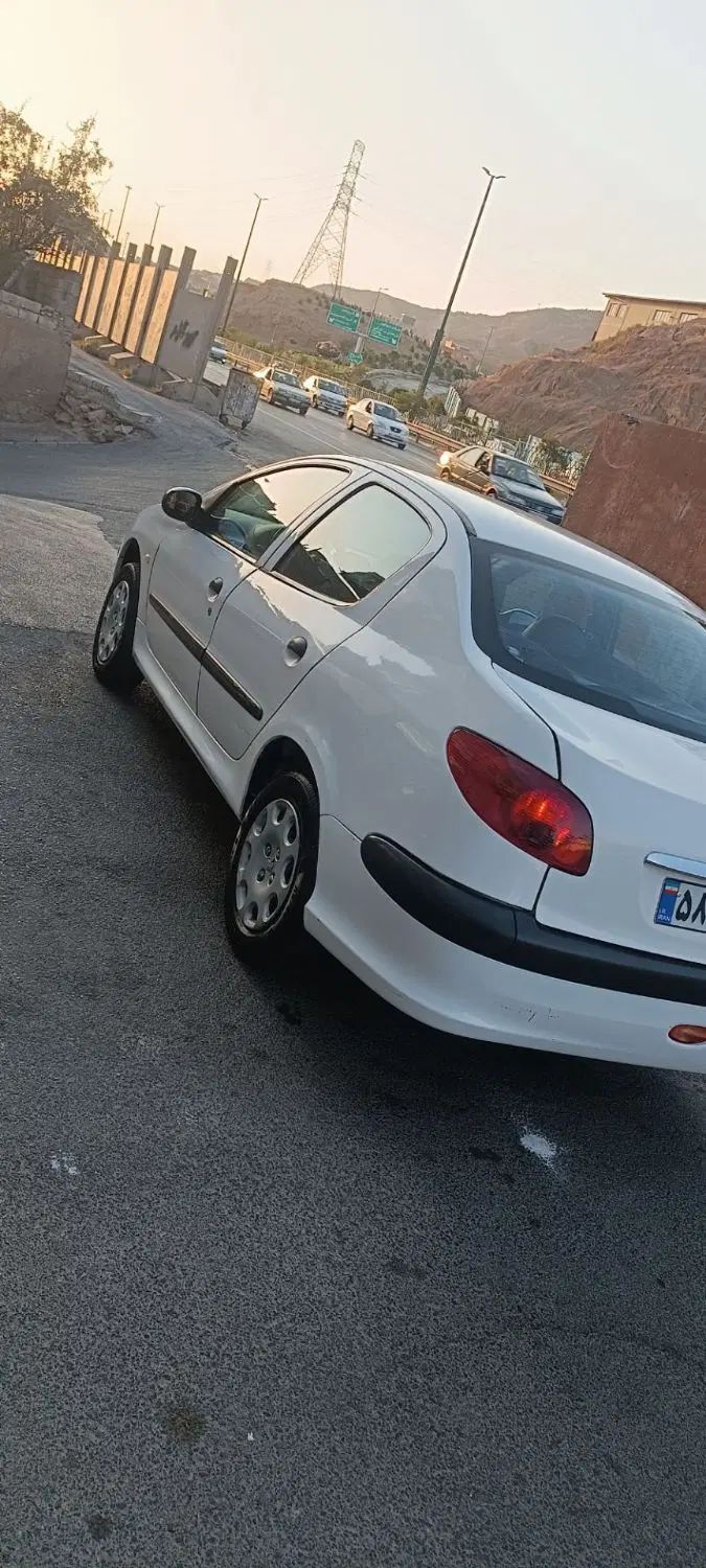 پژو ۲۰۶ صندوق دار v8 - 1391