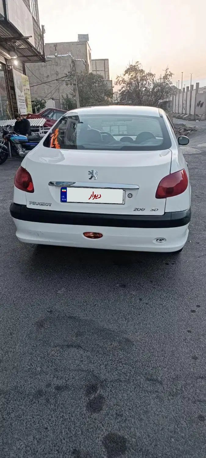 پژو ۲۰۶ صندوق دار v8 - 1391