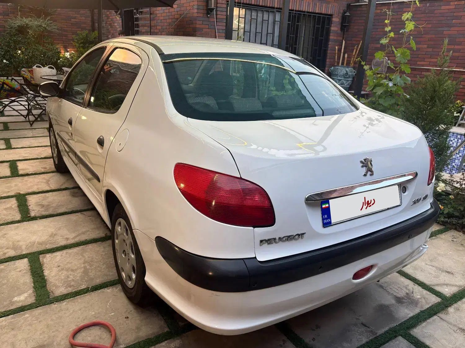 پژو ۲۰۶ صندوق دار v10 - 1390