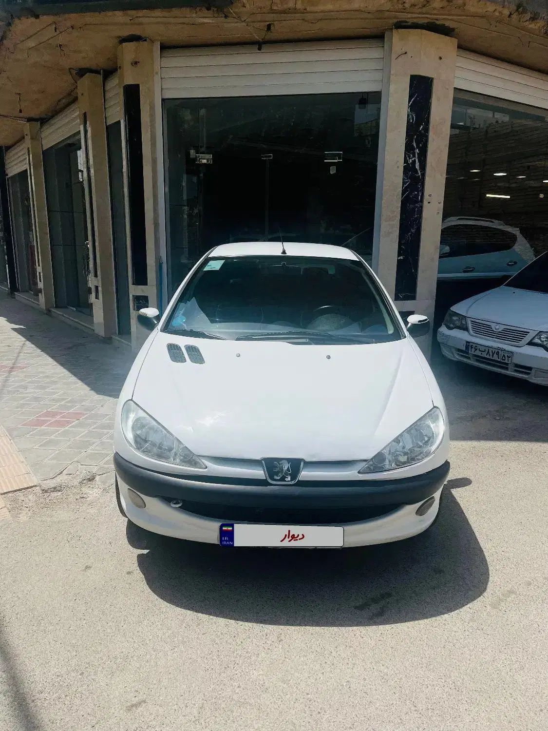 پژو ۲۰۶ صندوق دار v8 - 1394