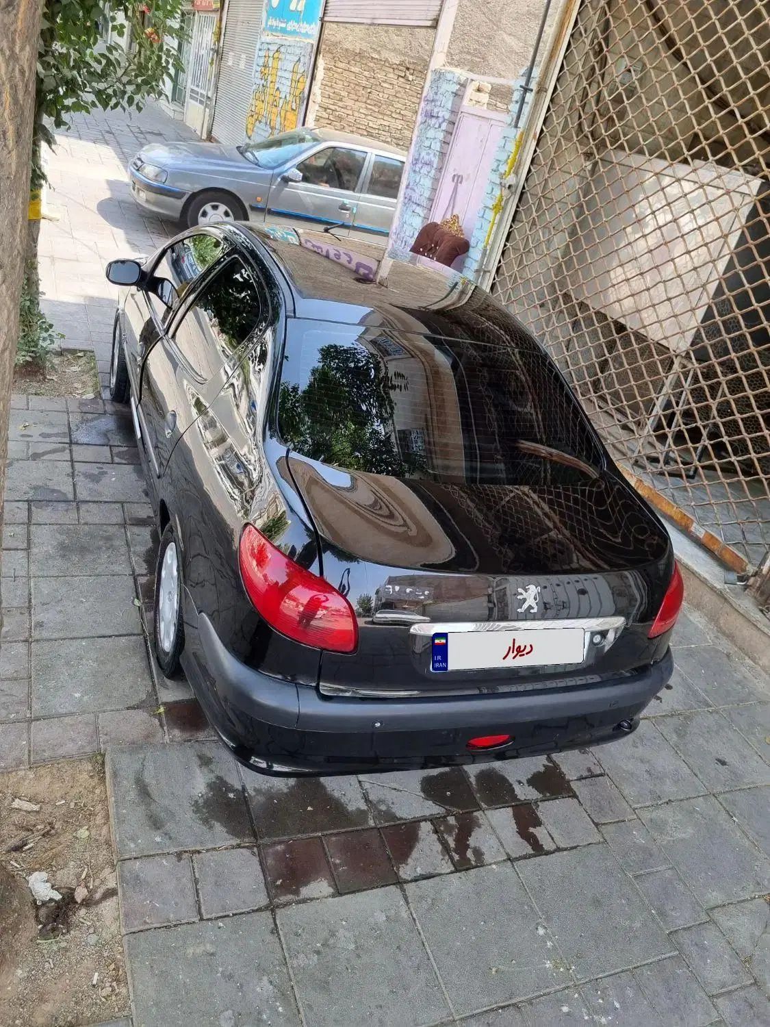 پژو ۲۰۶ صندوق دار v8 - 1394