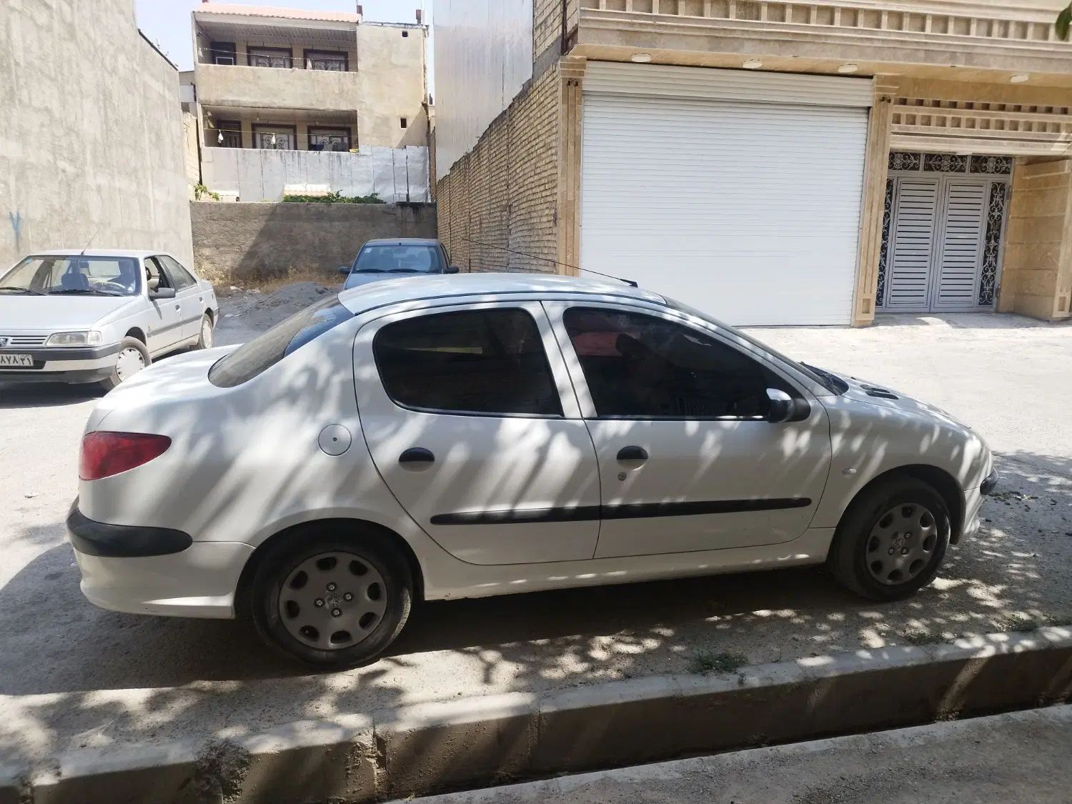 پژو ۲۰۶ صندوق دار v8 - 1398