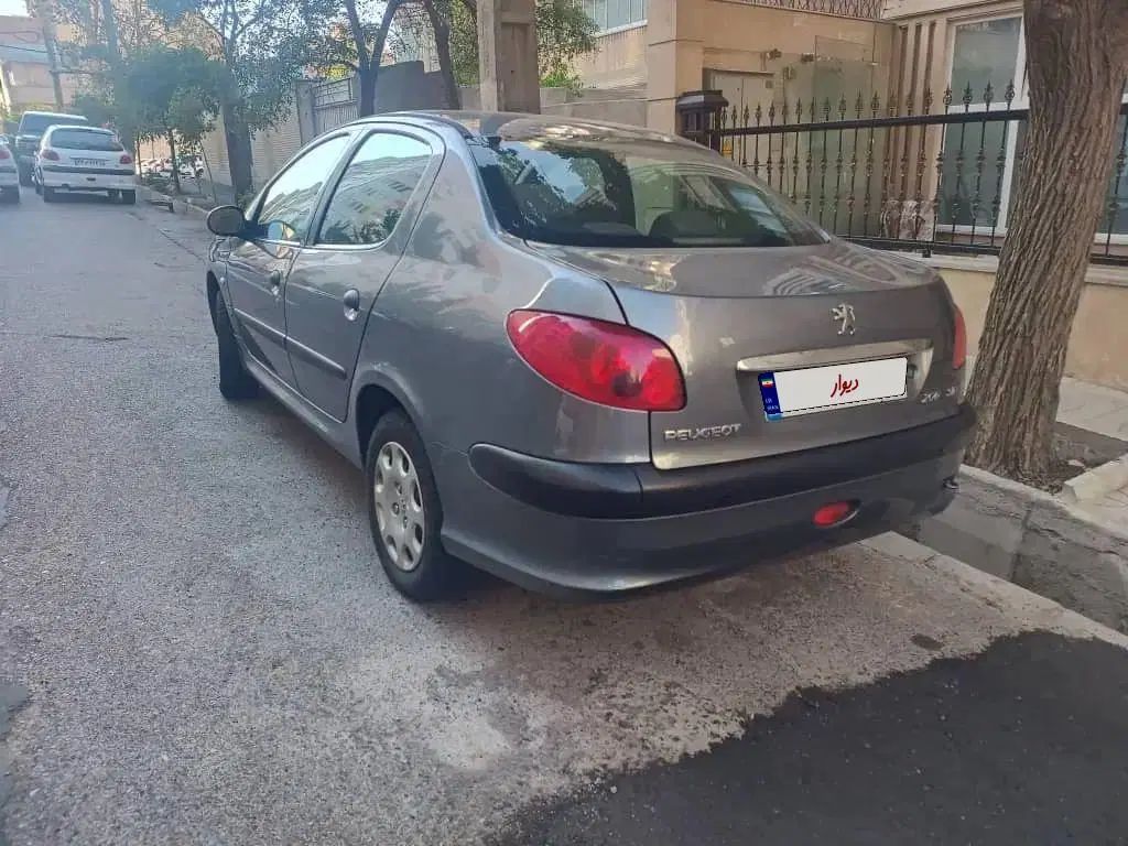 پژو ۲۰۶ صندوق دار v8 - 1394