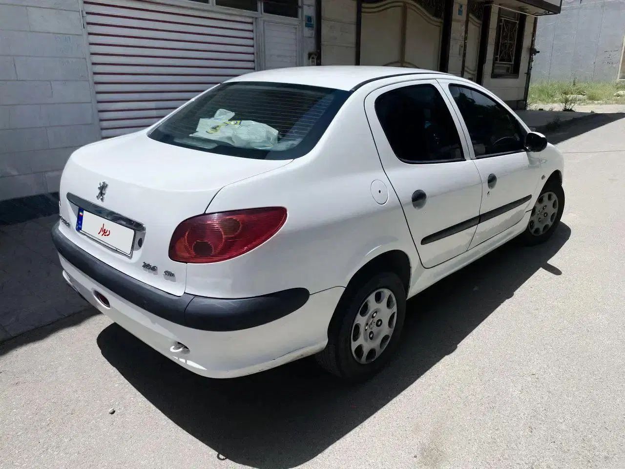 پژو ۲۰۶ صندوق دار v8 - 1395