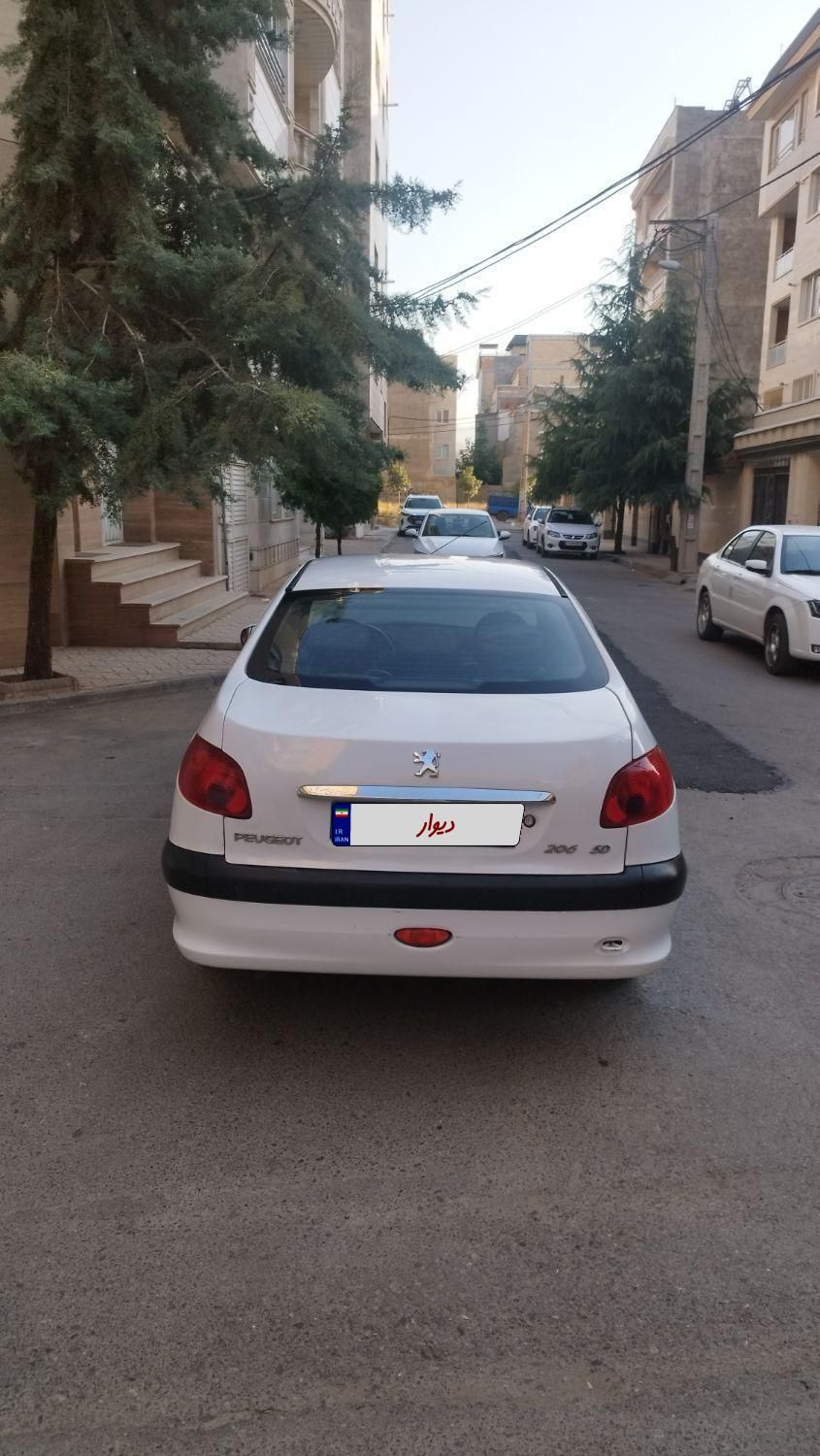 پژو ۲۰۶ صندوق دار v8 - 1396