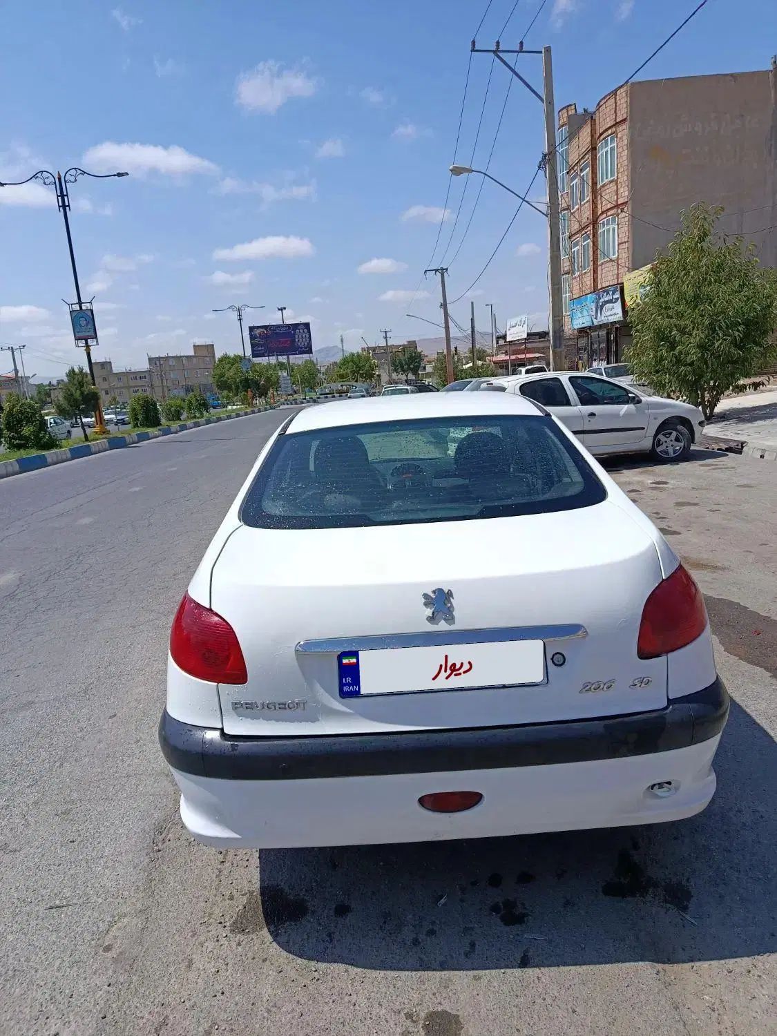 پژو ۲۰۶ صندوق دار v8 - 1396
