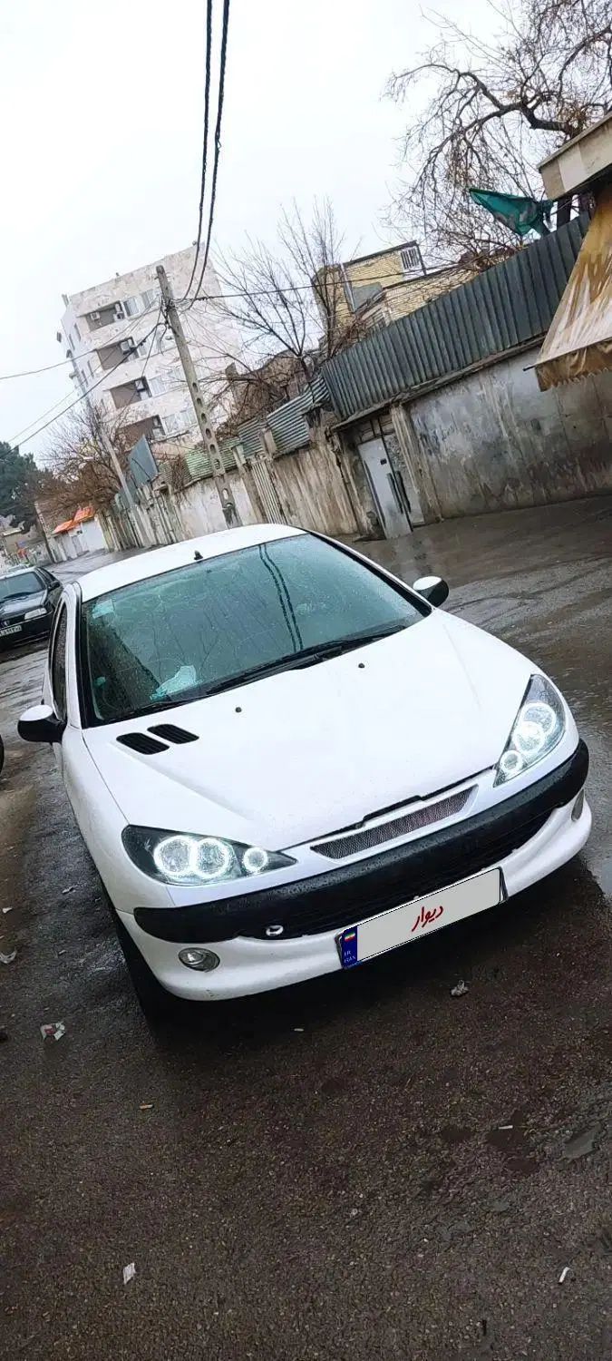 پژو ۲۰۶ صندوق دار v8 - 1392