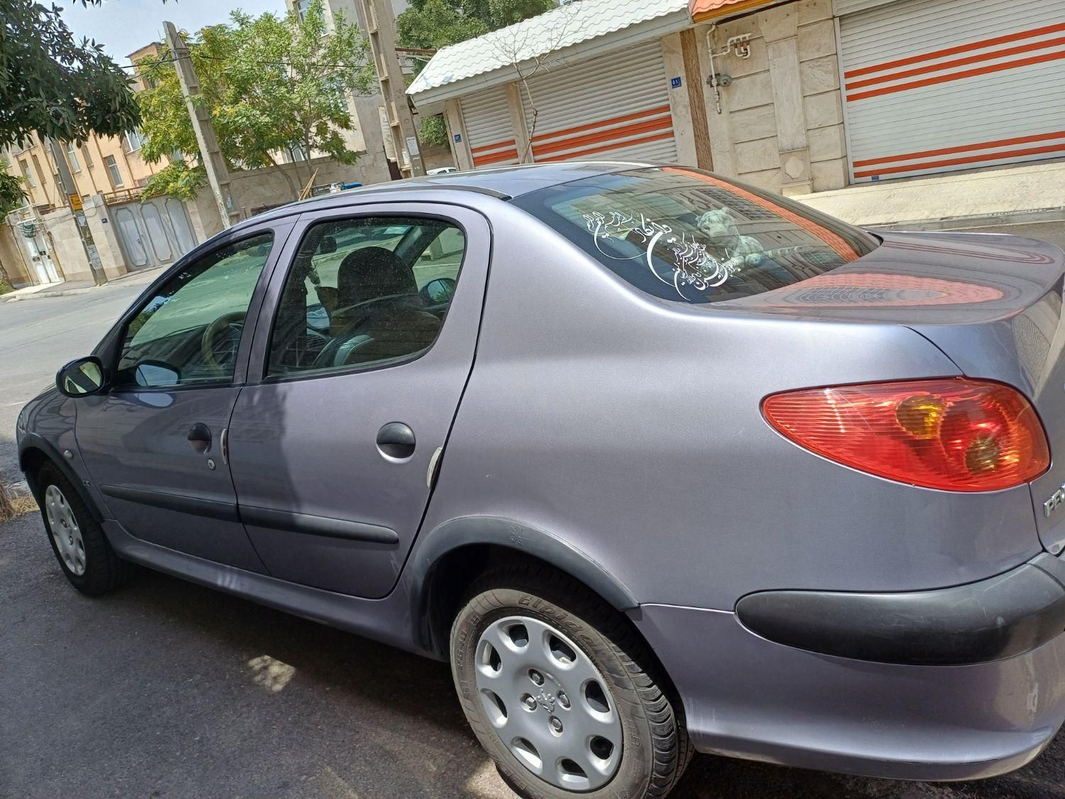 پژو ۲۰۶ صندوق دار v8 - 1394