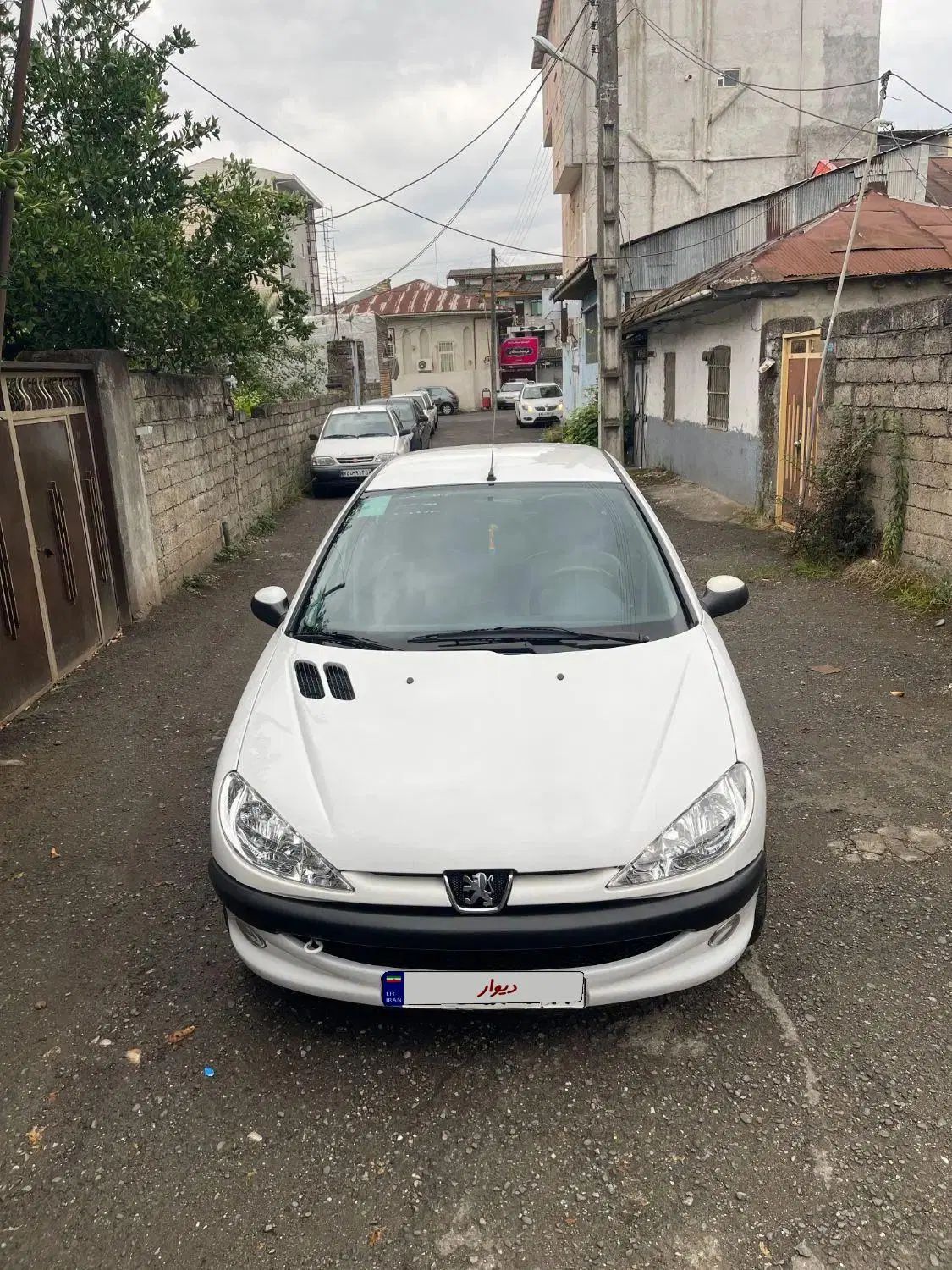 پژو ۲۰۶ صندوق دار v8 - 1397