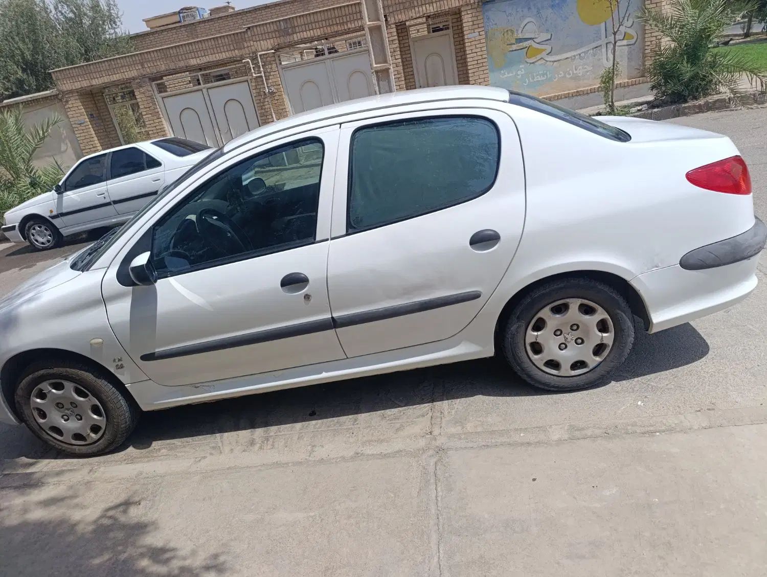 پژو ۲۰۶ صندوق دار v8 - 1396