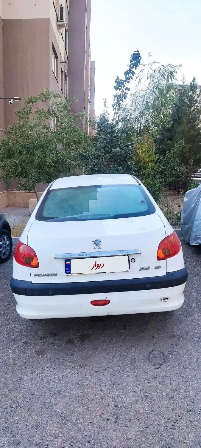 پژو ۲۰۶ صندوق دار v8 - 1393