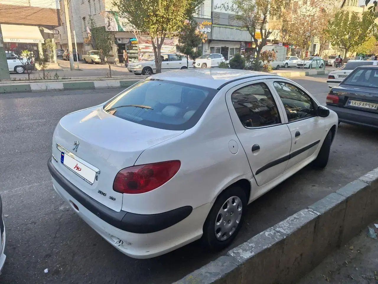 پژو ۲۰۶ صندوق دار v8 - 1396