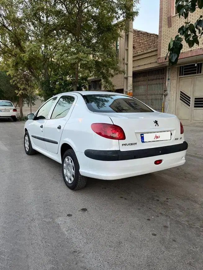 پژو ۲۰۶ صندوق دار v8 - 1394