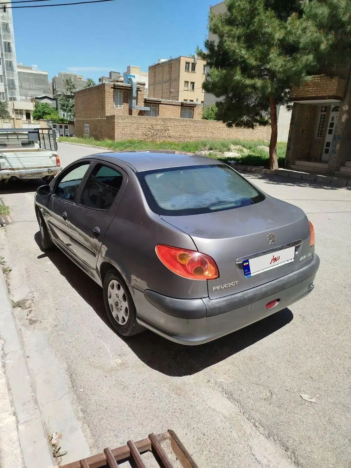 پژو ۲۰۶ صندوق دار v20 - 1390