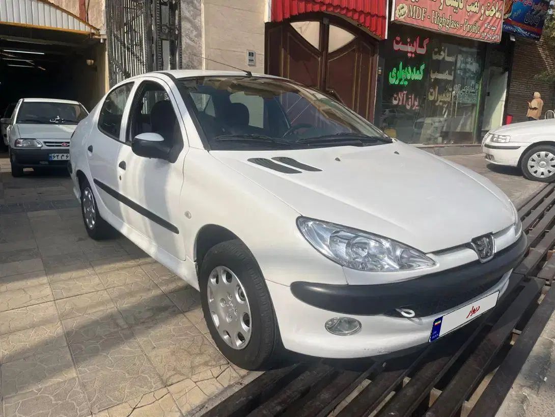 پژو ۲۰۶ صندوق دار v8 - 1395